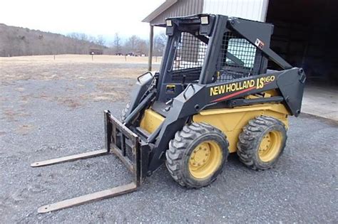 160 new holland skid steer diesel fuel in oil|new holland ls160 oil clearance.